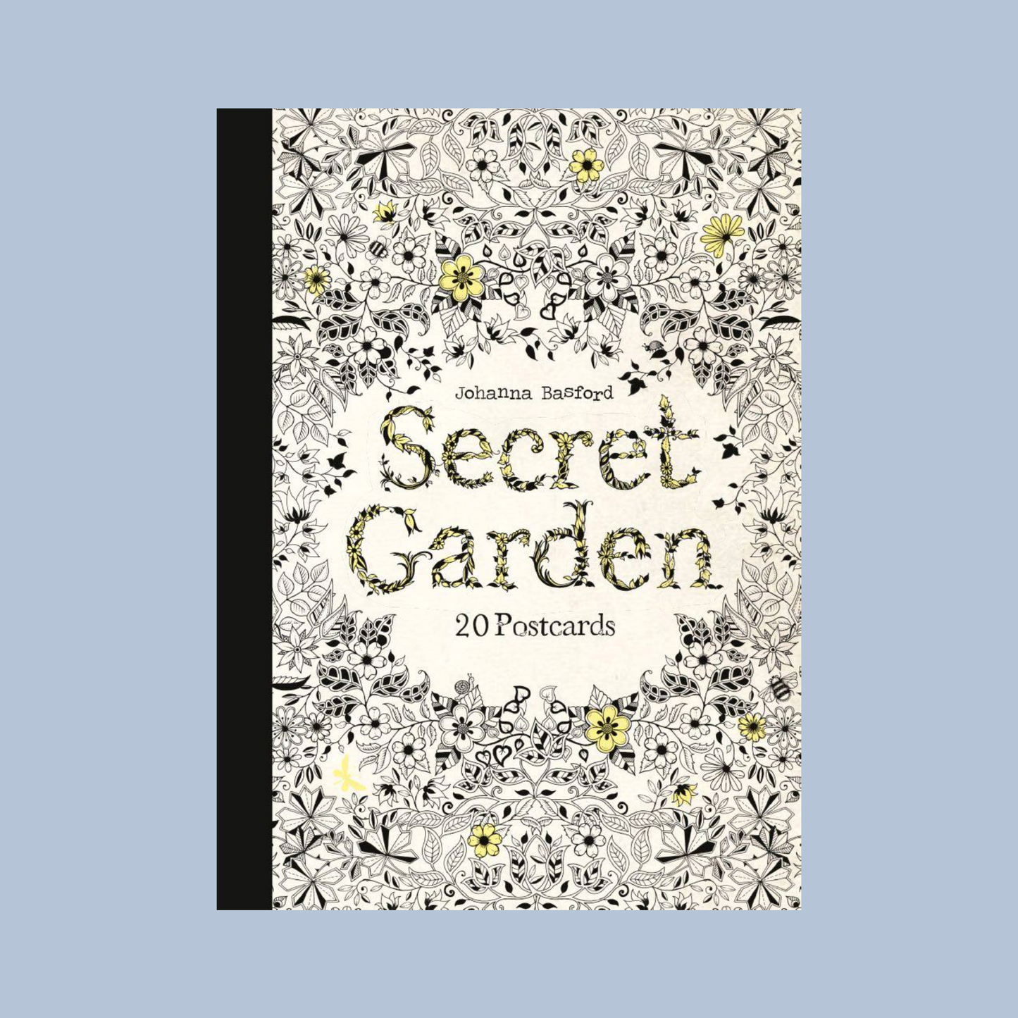 Postcard book titled 'Secret Garden' with floral design on a light blue background