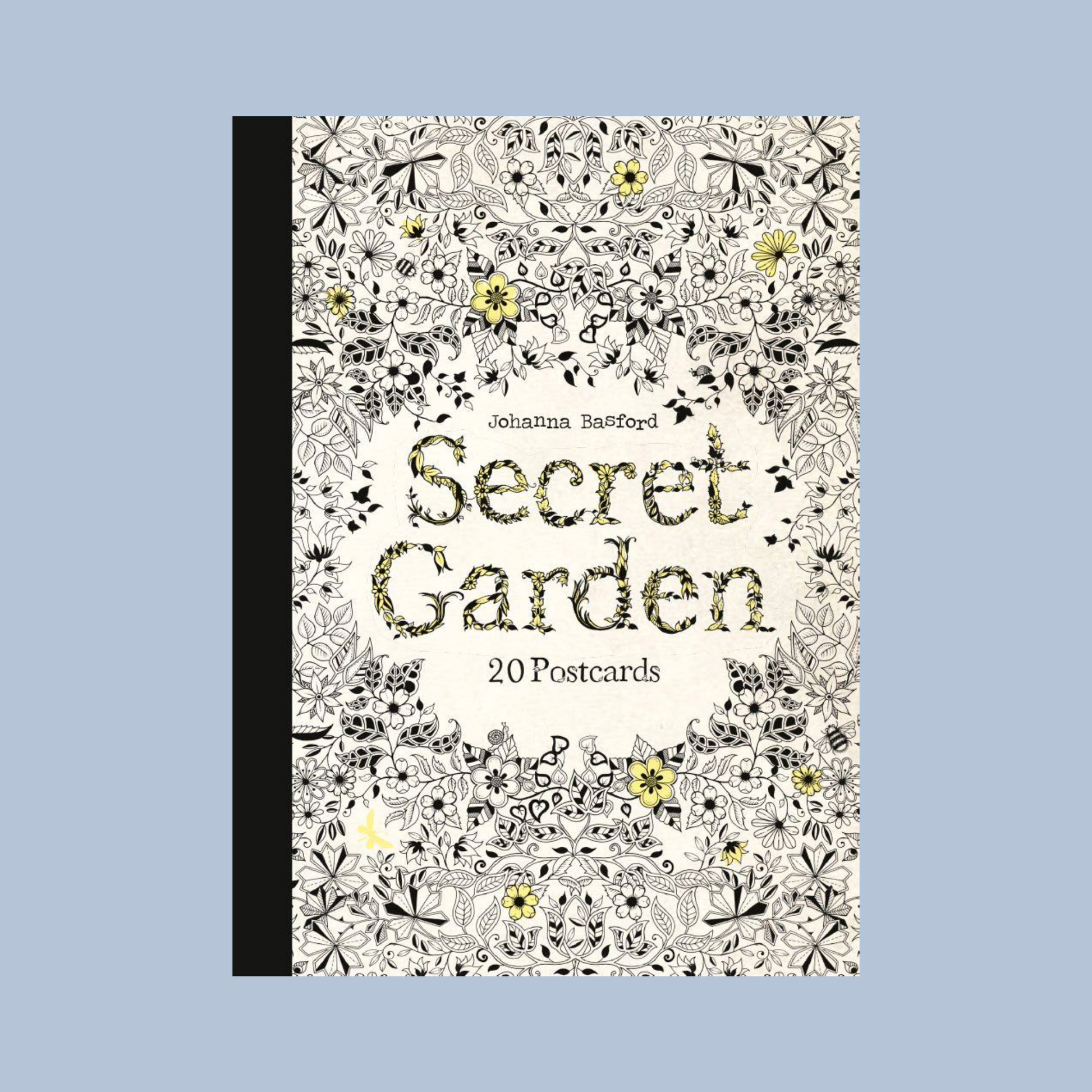 Postcard book titled 'Secret Garden' with floral design on a light blue background