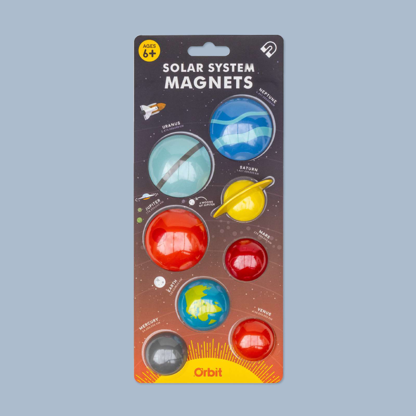 Orbit Solar System Magnets toy set in its original retail blister packaging, featuring colorful spherical planet magnets on a dark space-themed backing card.