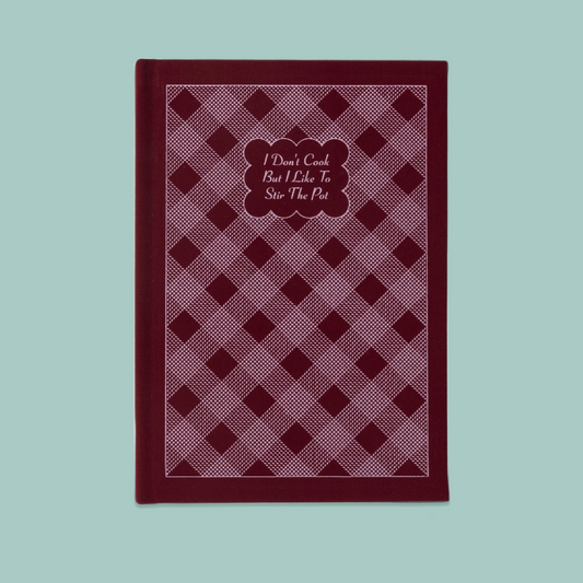 Berry gingham fabric notebook with cursive text. 