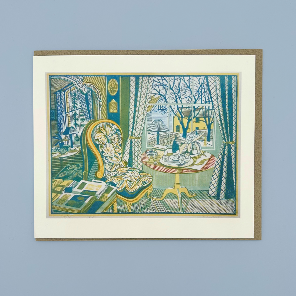 Greetings card with an illustration of furniture in a blue room, on a blue background.