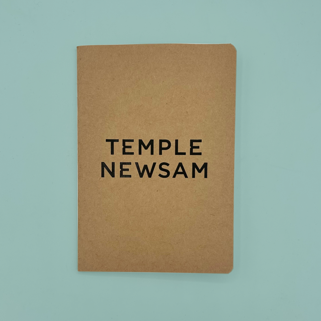 Kraft brown sketchbook with rounded edges and Temple Newsam branding. The sketchbook is on a teal background.