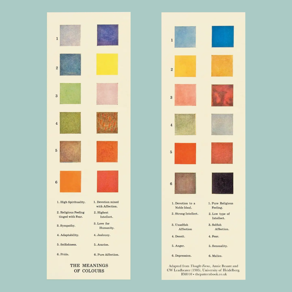 A printed bookmark titled 'THE MEANINGS OF COLOURS' with two columns of numbered color tiles and text labels on a pale blue background.