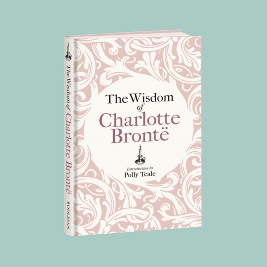 Book titled 'The Wisdom of Charlotte Bronte' with decorative cover on a light blue background