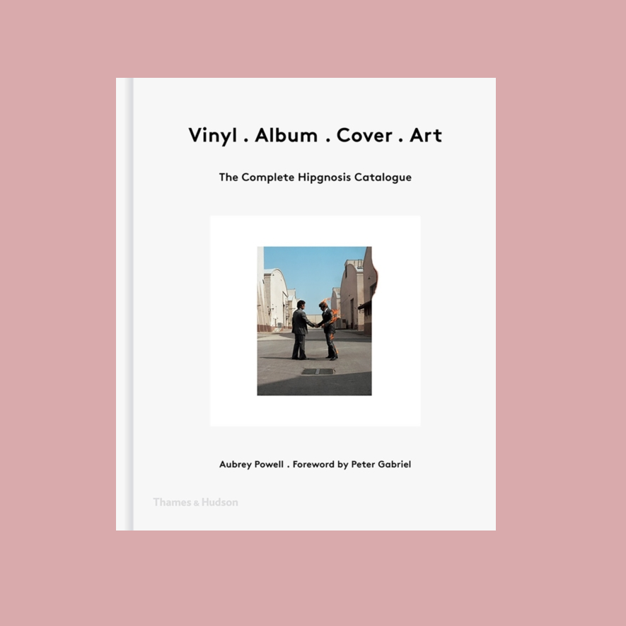 Book titled 'Vinyl. Album. Cover. Art' on a pink background
