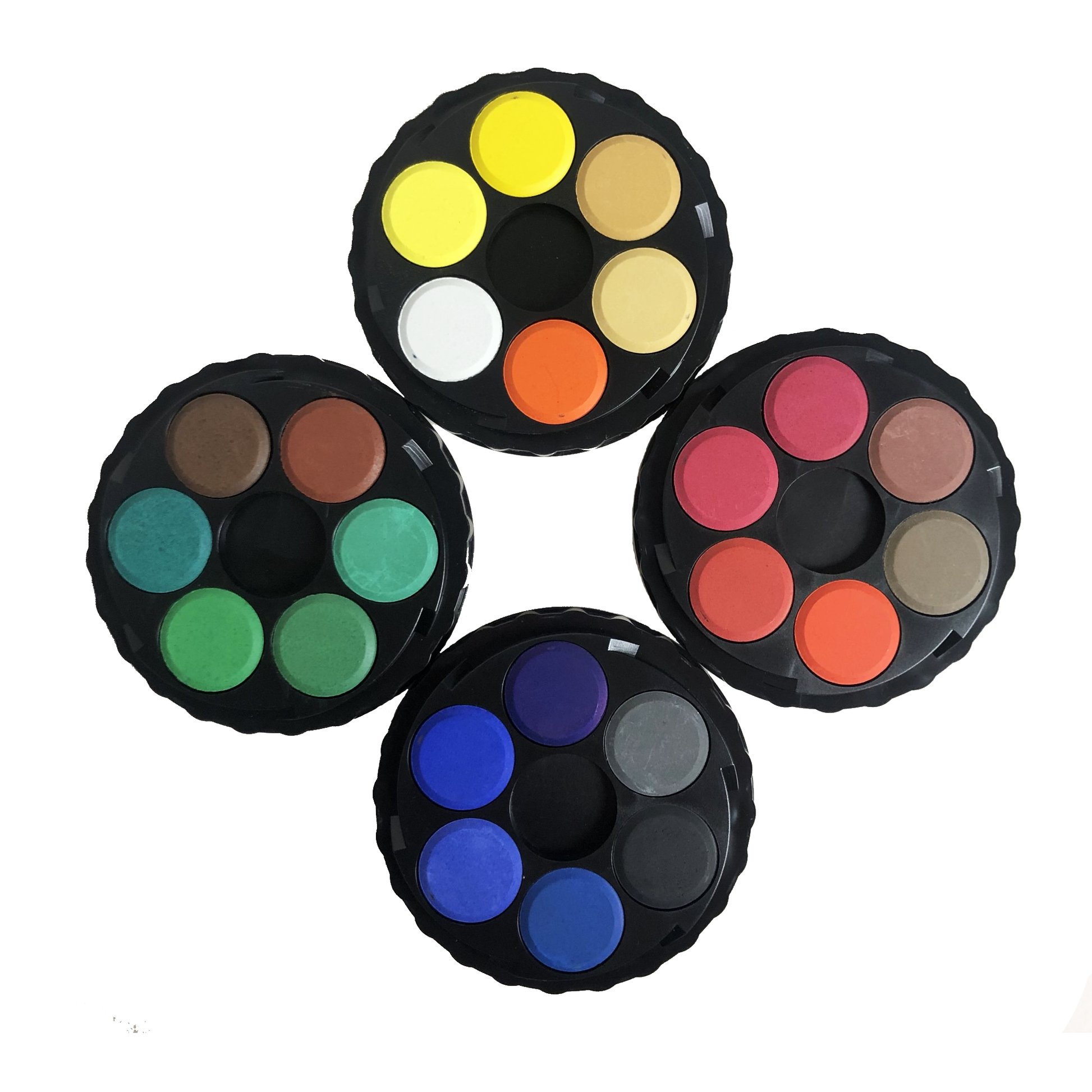 Set of four round color palettes with various colors on a white background