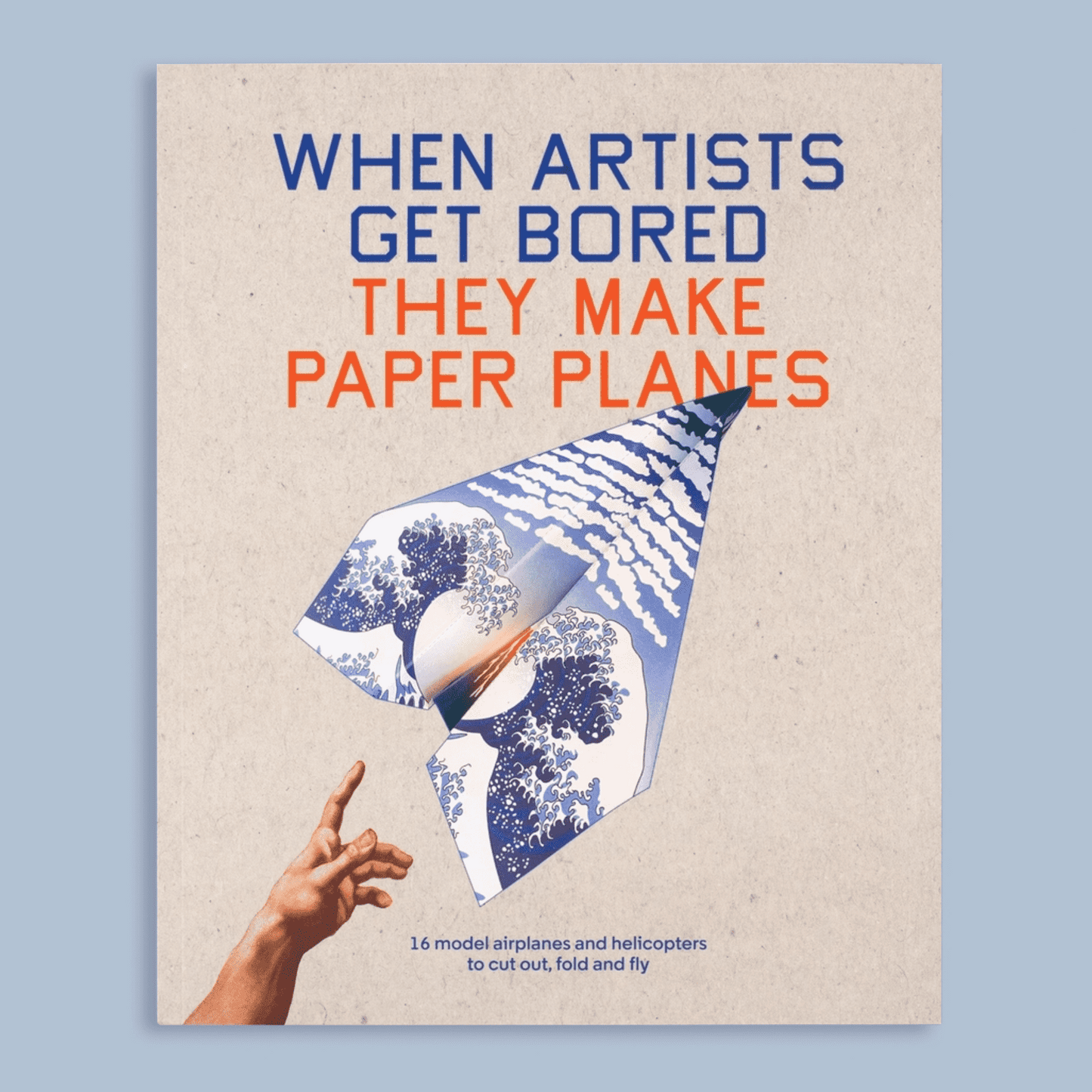 Book cover with text 'When artists get bored they make paper planes' and a paper airplane design.
