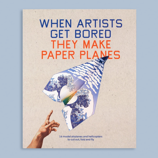 Book cover with text 'When artists get bored they make paper planes' and a paper airplane design.
