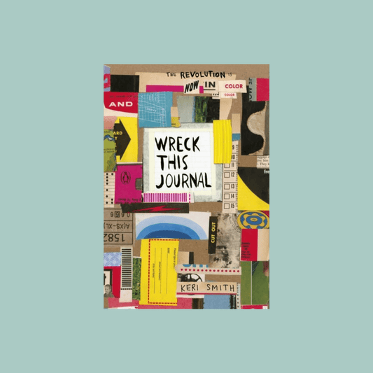 Colorful book cover of 'Wreck This Journal' with text on a light blue background